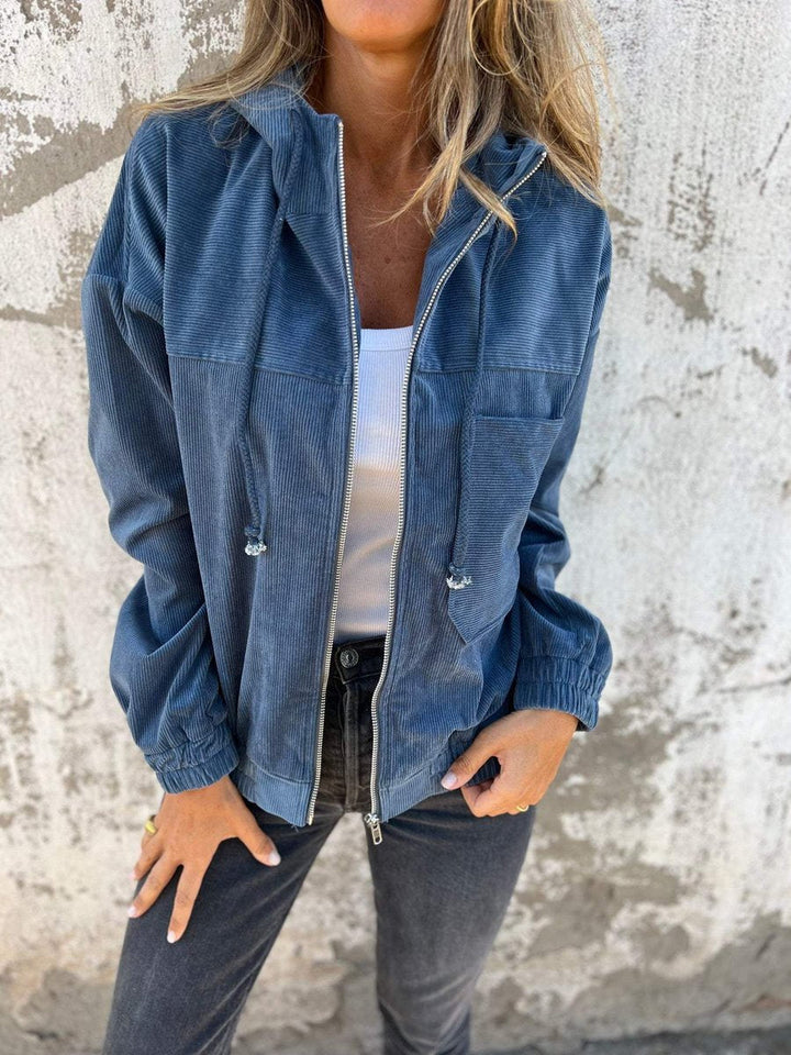 Women’s ribbed zip-up hooded jacket by Bennett and Lowe, featuring quilted corduroy fabric and an oversized fit.