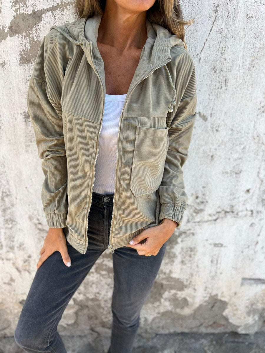 Women’s ribbed zip-up hooded jacket by Bennett and Lowe, oversized fit, quilted corduroy design with front zipper and hood.