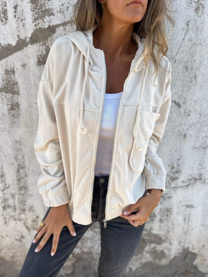 Lauren Bennett and Lowe women's ribbed quilted zip-up hooded jacket with oversized fit, featuring corduroy texture and front zipper.