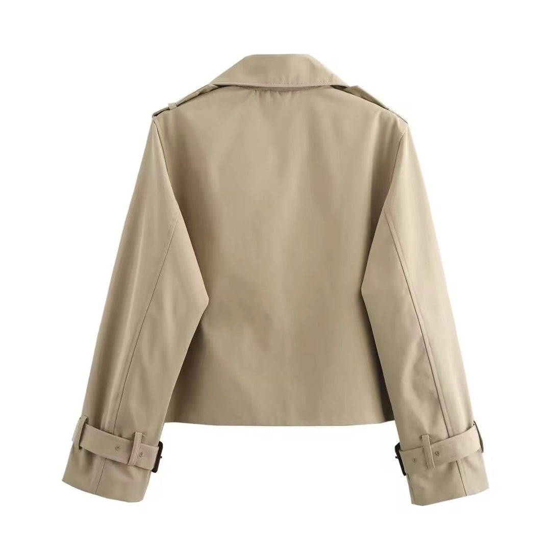 Women's cropped double-breasted trench coat by Bennett and Lowe with buckle cuffs, stylish and tailored for a modern look.