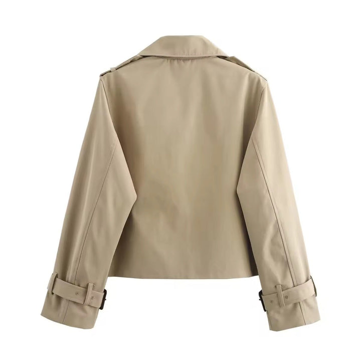 Women's cropped double-breasted trench coat by Bennett and Lowe with buckle cuffs, stylish and tailored for a modern look.