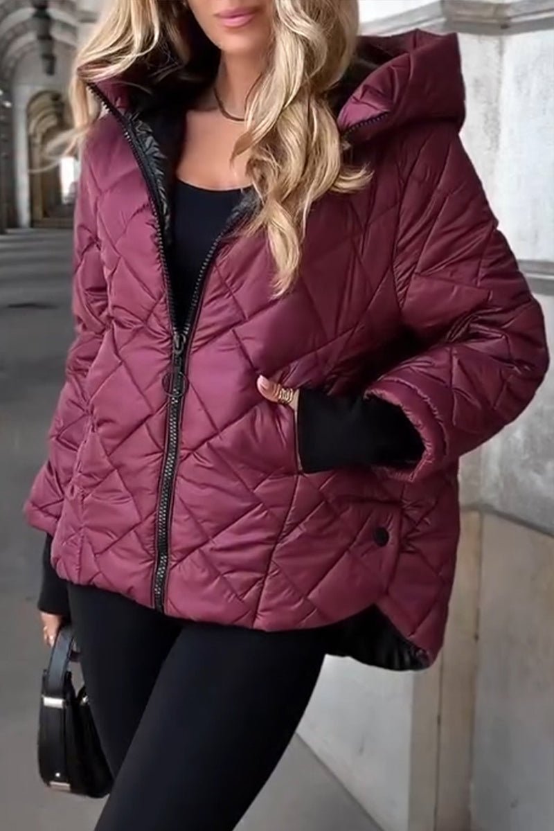 Women's Bennett and Lowe Marina diamond quilted hooded zip-up puffer jacket, shown in a close-up view of the stylish quilted design.