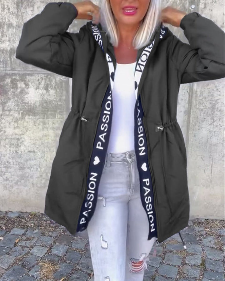 Women’s hooded drawstring midi parka coat by Bennett and Lowe, featuring a relaxed fit, hood, and front pockets.