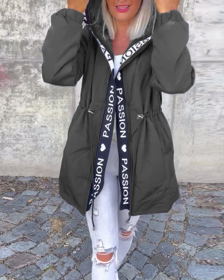 Women’s hooded drawstring midi parka coat by Bennett and Lowe, featuring a stylish hood, adjustable drawstrings, and a sleek mid-length design.