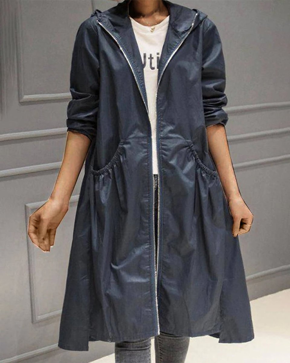 Women’s Kathleen Bennett and Lowe waterproof hooded long trench coat with zip-up front, stylish and functional outerwear for rainy days.