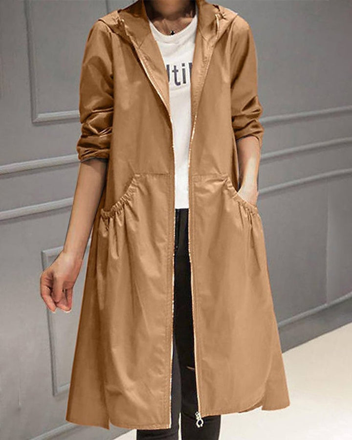 Women’s waterproof hooded long trench coat by Bennett and Lowe, featuring a zip-up front and stylish design.