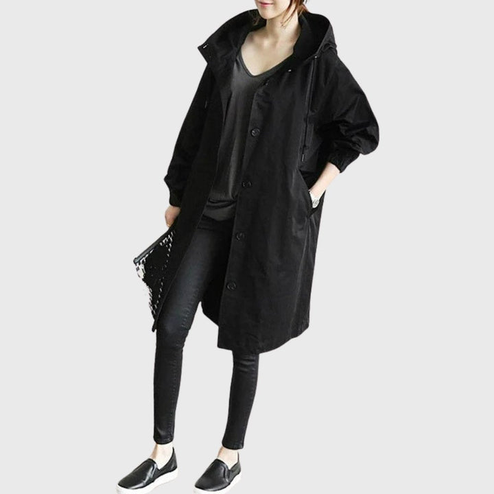 Women’s Bennett and Lowe Ruth hooded waterproof long trench coat, relaxed fit, with a belt and classic design.