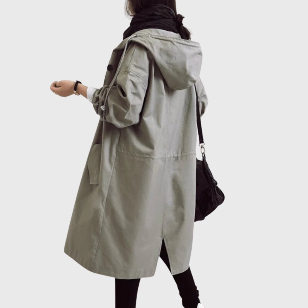 Women’s waterproof hooded long trench coat by Bennett and Lowe, relaxed fit with a stylish and functional design.