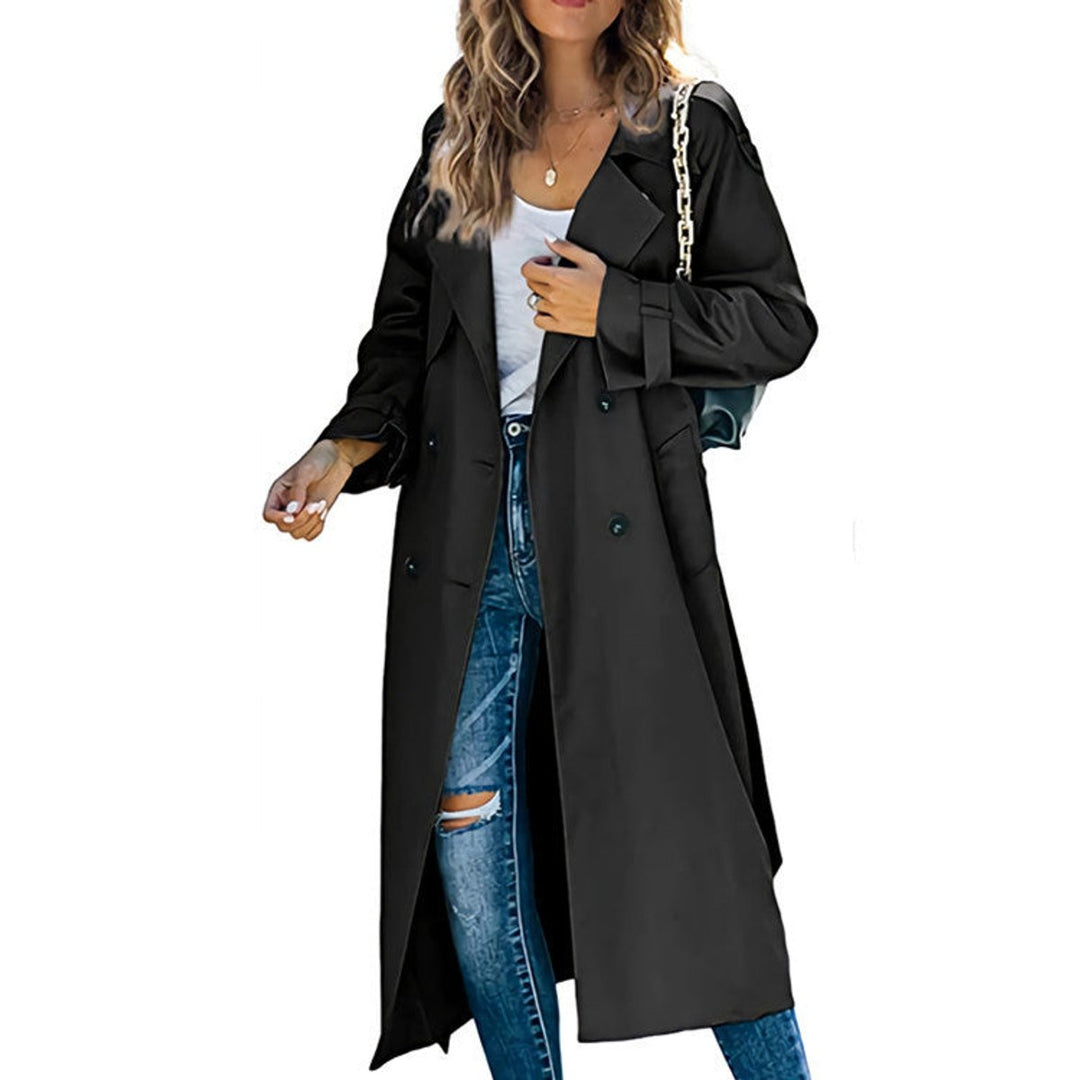 Women's Bennett and Lowe Juliet double-breasted belted longline trench coat, oversized style, beige fabric, classic collar, and waist belt.