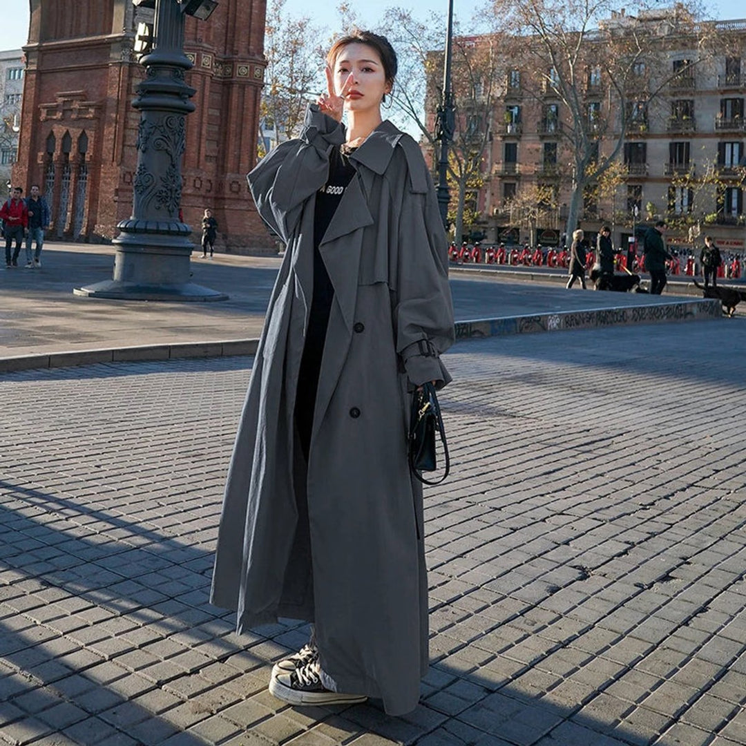 Bennett and Lowe Lena oversized double-breasted long trench coat for women, beige, with wide lapels and belt detail.