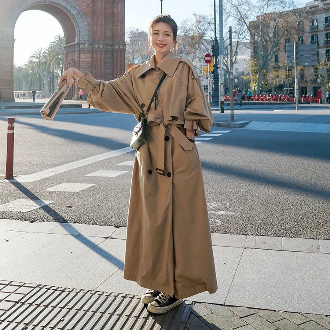 Bennett and Lowe Lena oversized double-breasted long trench coat for women, beige with wide lapels and belted waist.