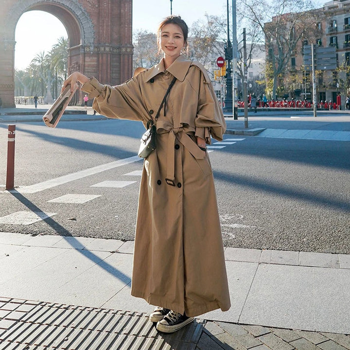 Bennett and Lowe Lena oversized double-breasted long trench coat for women, beige with wide lapels and belted waist.