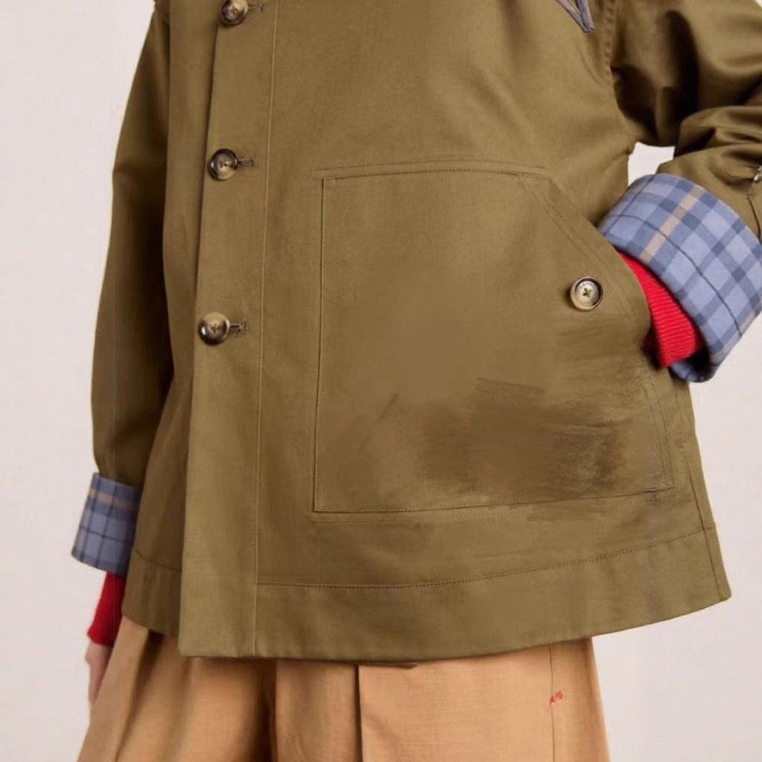 Women’s oversized double-breasted utility coat by Bennett and Lowe, plaid-lined trench coat with a relaxed fit and classic design.