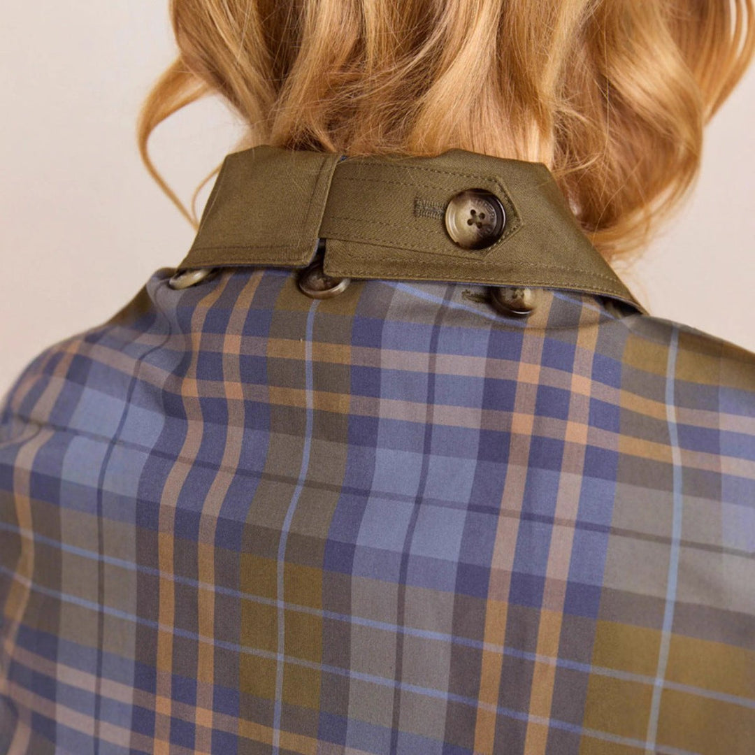 Women’s oversized double-breasted plaid-lined utility coat by Bennett and Lowe, featuring a stylish trench design and button details.