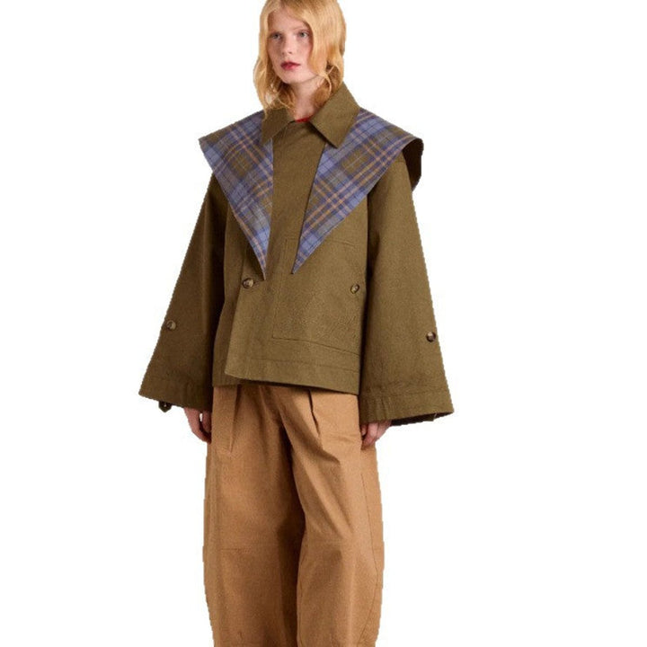 Women's oversized double-breasted plaid-lined utility coat by Bennett and Lowe, featuring a classic trench style and functional design.