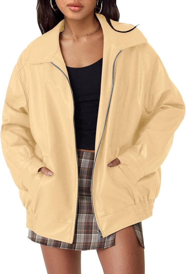 Women’s oversized faux leather zip-up bomber jacket by Bennett and Lowe, relaxed fit with ribbed cuffs and collar.