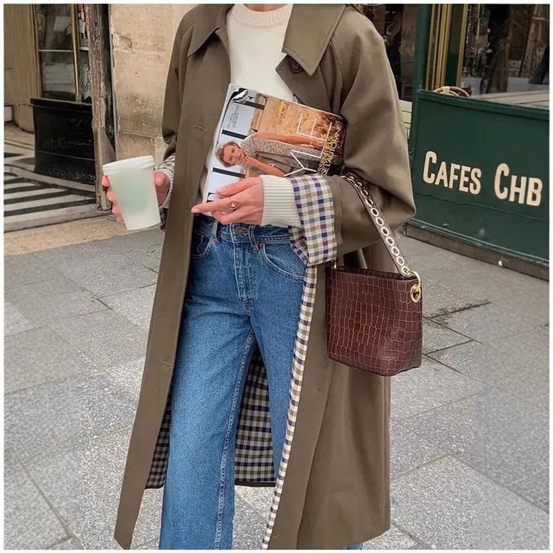 Women’s oversized plaid-lined long trench coat by Bennett and Lowe, featuring a refined, stylish silhouette and classic trench design.