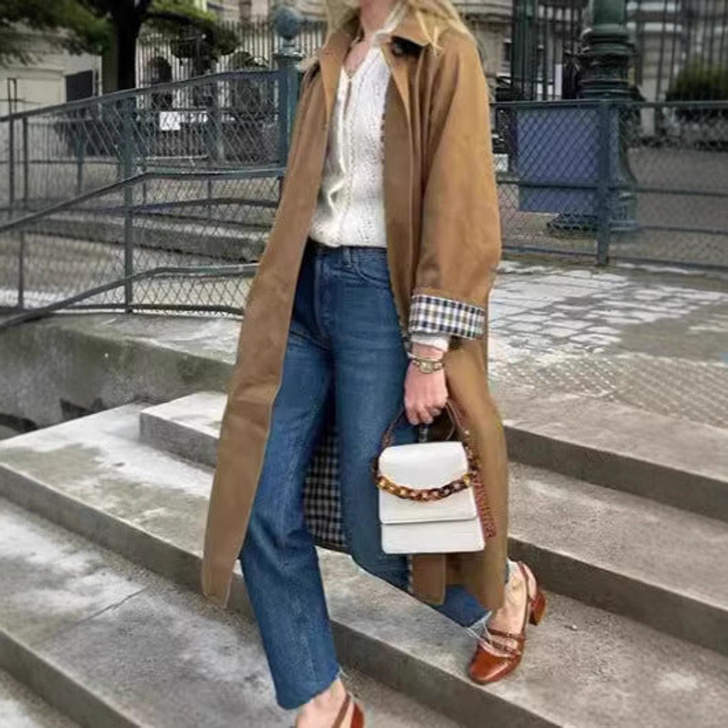 Women’s oversized plaid-lined long trench coat by Bennett and Lowe, featuring a refined, stylish design and classic trench silhouette.