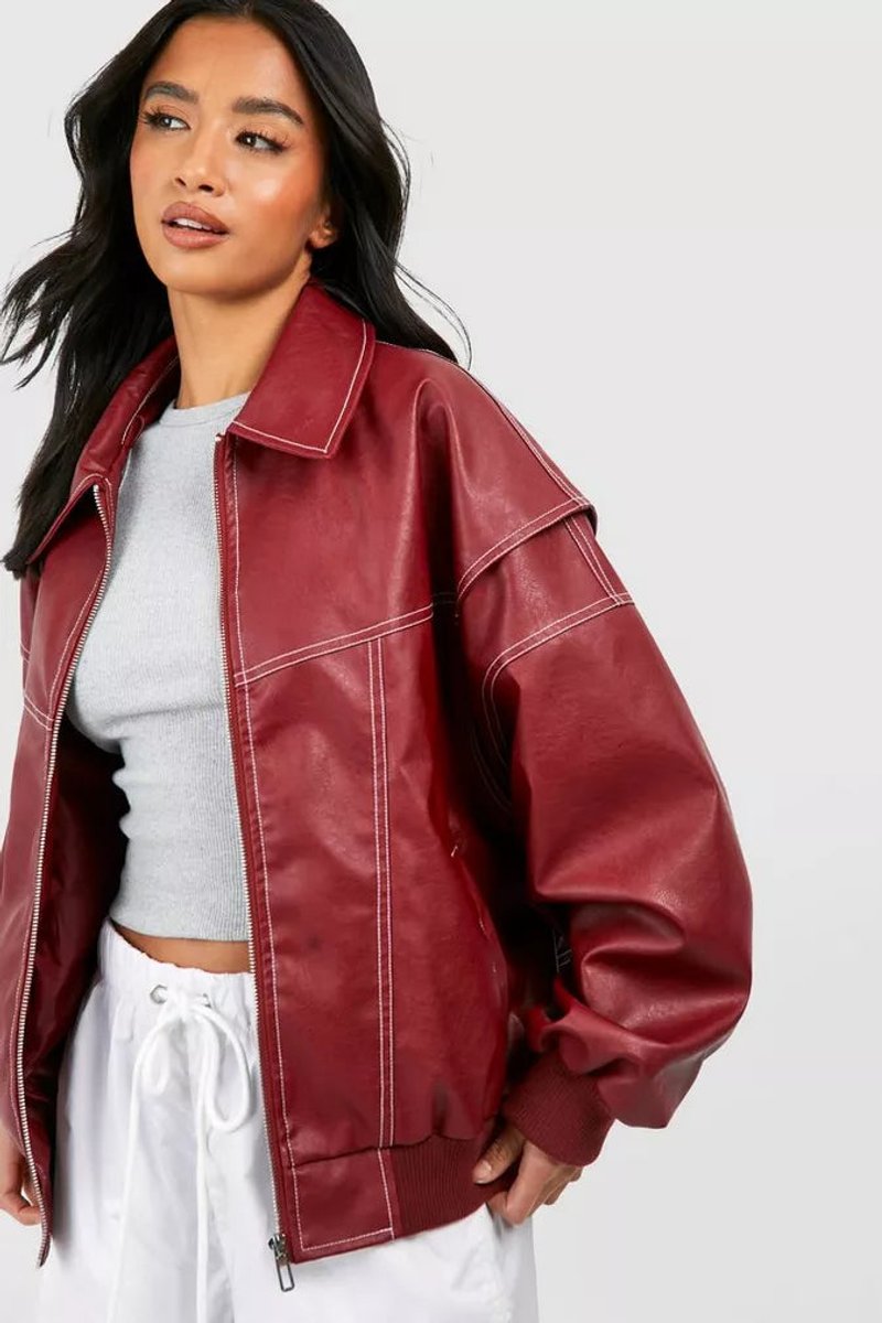 Womens oversized quilted bomber jacket with contrast stitching by Bennett and Lowe, featuring a relaxed fit and stylish design.