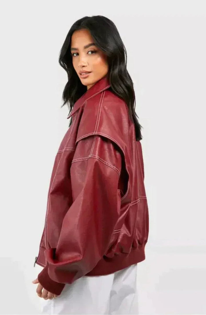 Women’s oversized quilted bomber jacket with contrast stitching by Bennett and Lowe, featuring a stylish, relaxed fit and ribbed cuffs.