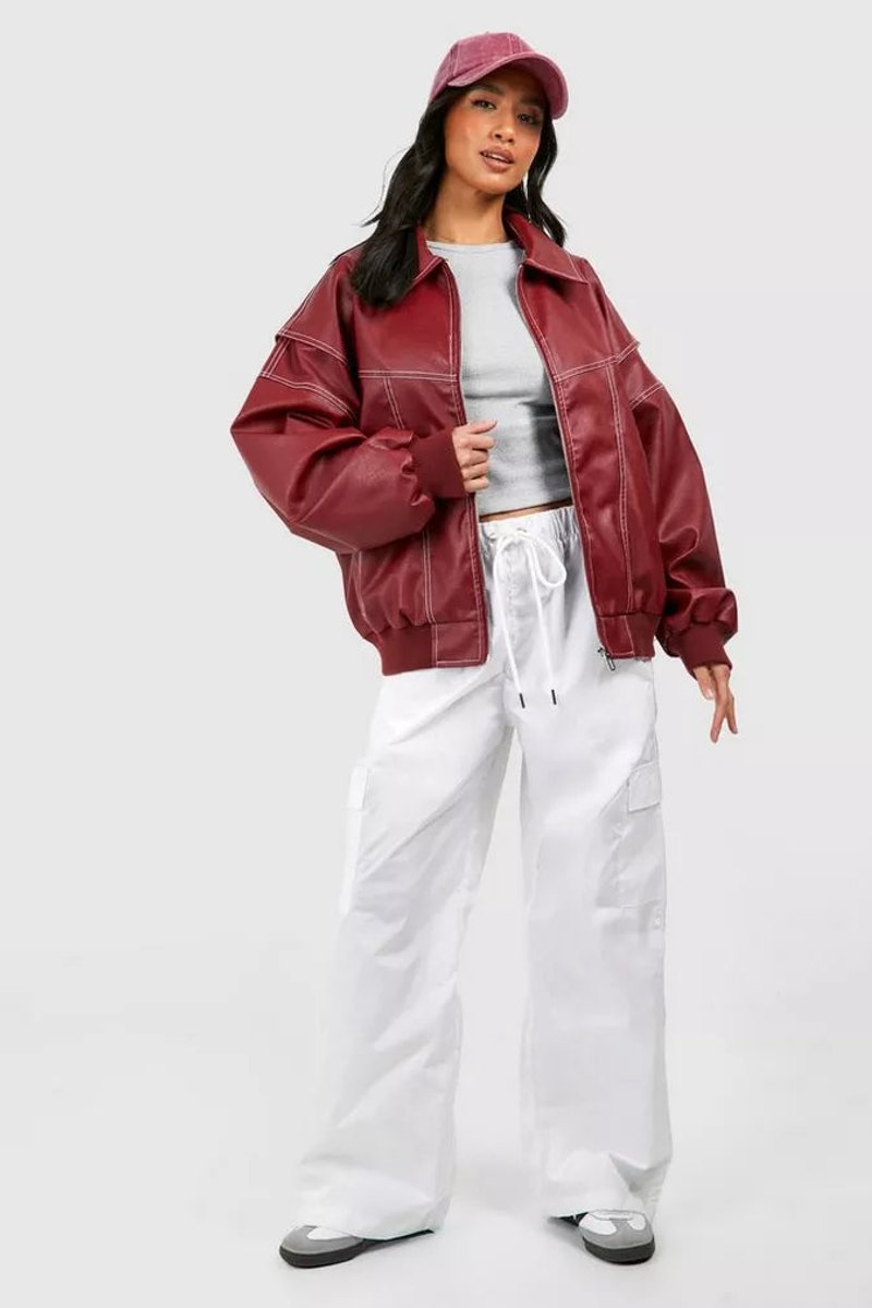 Women’s oversized quilted bomber jacket with contrast stitching by Bennett and Lowe, shown in a relaxed fit with ribbed cuffs and collar.