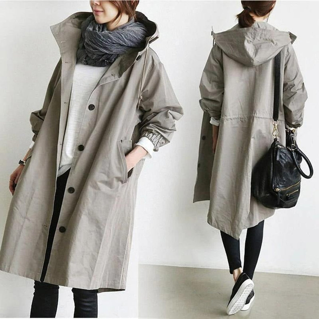 Women's oversized Bennett and Lowe water-resistant hooded button-front coat, stylish trench design with large front buttons.