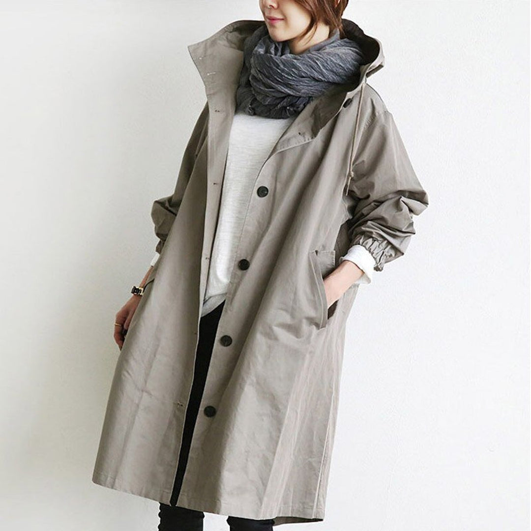 Women’s oversized water-resistant coat with hood and button-front design by Bennett and Lowe, perfect for stylish weather protection.
