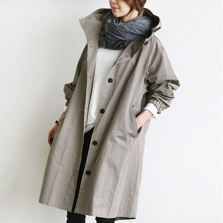 Women’s oversized water-resistant coat with hood and button-front design by Bennett and Lowe, perfect for stylish weather protection.