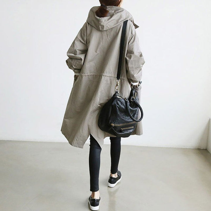 Women’s oversized Bennett and Lowe water-resistant hooded button-front coat, featuring a relaxed fit and classic trench design.