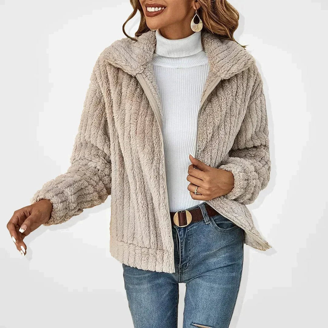 Women's quilted zip-up jacket by Bennett and Lowe, plush fleece coat with cozy, fluffy fleece interior and stylish design.