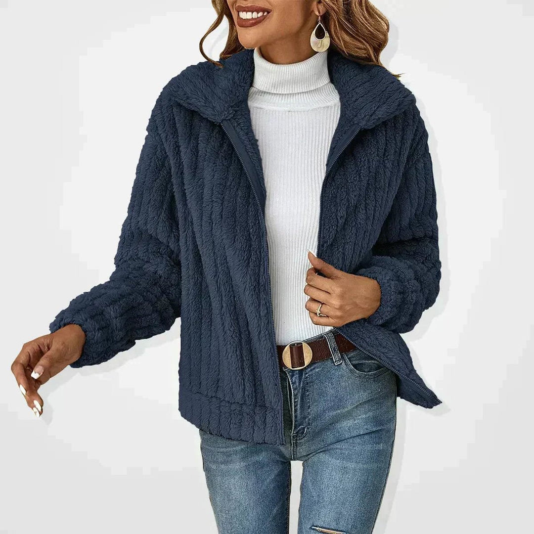 Women’s quilted plush fleece zip-up jacket by Bennett and Lowe, featuring a cozy, fluffy design and a comfortable fit.