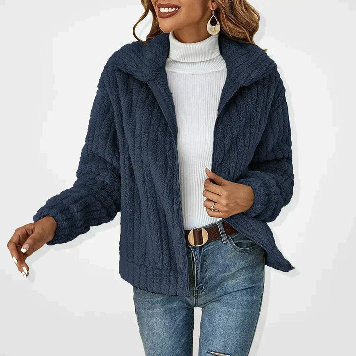 Women’s quilted plush fleece zip-up jacket by Bennett and Lowe, featuring a cozy, fluffy design and a comfortable fit.