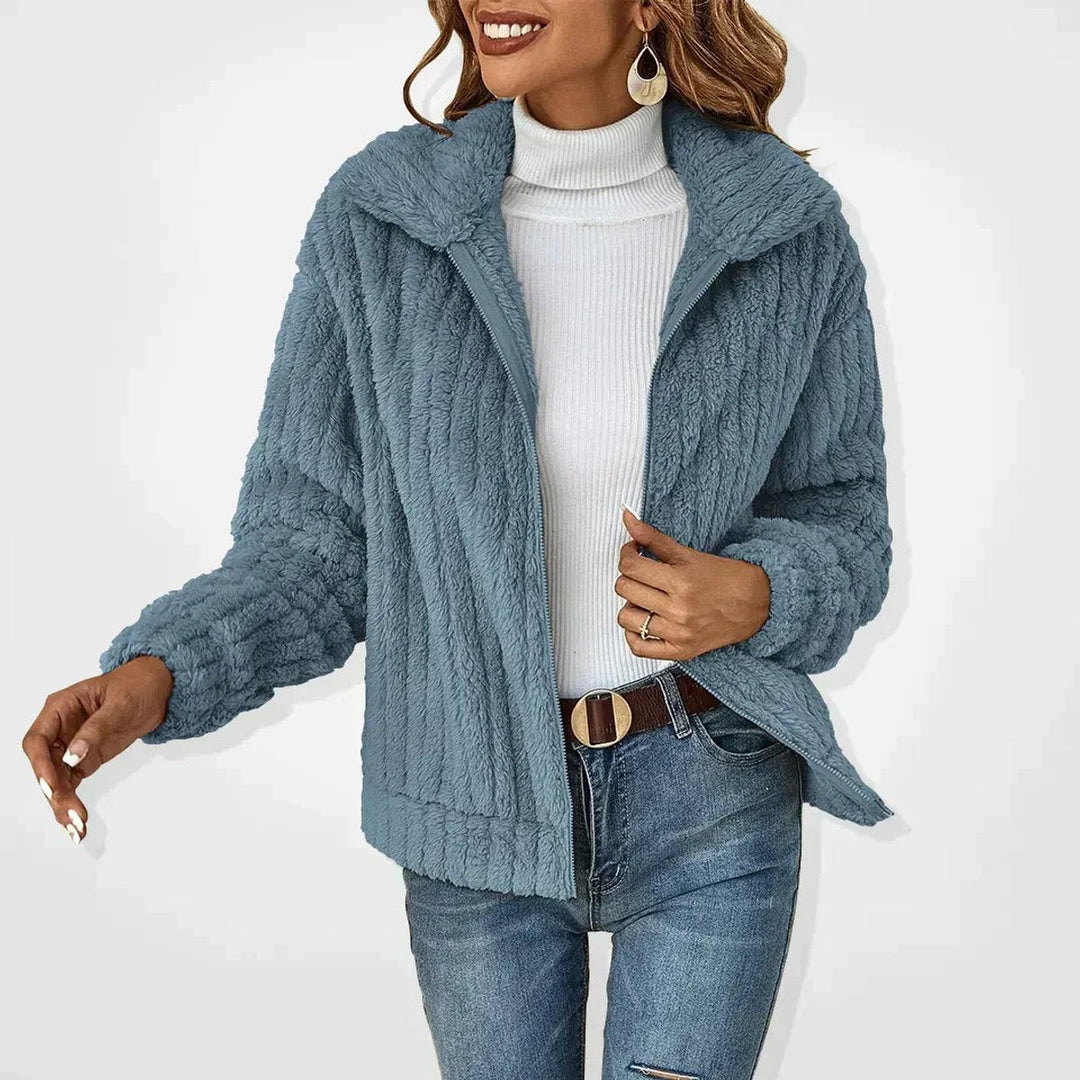 Women's quilted plush fleece zip-up jacket by Bennett and Lowe, featuring a cozy and fluffy design for warmth and comfort.