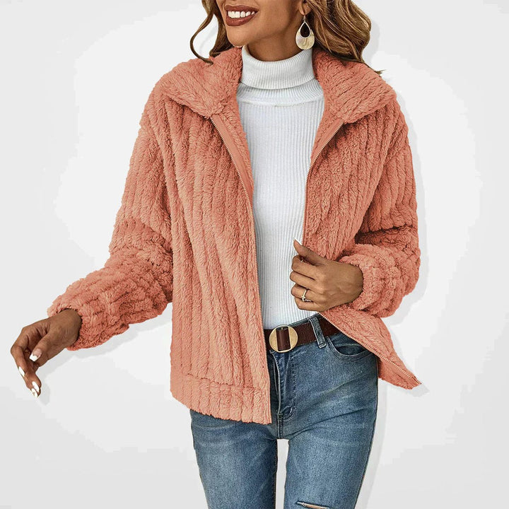 Women's quilted fleece zip-up jacket by Bennett and Lowe, featuring a cozy plush fleece exterior and comfortable fit.