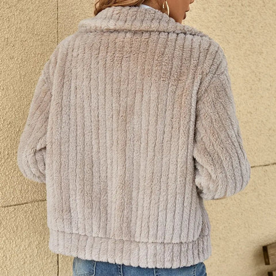 Women's quilted fleece zip-up jacket by Bennett and Lowe with plush, fluffy interior and cozy design for warmth.