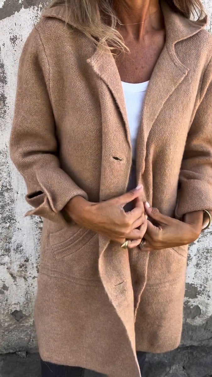 Women’s relaxed-fit longline lapel coat by Bennett and Lowe, with button front and tailored lapel design for a sleek look.