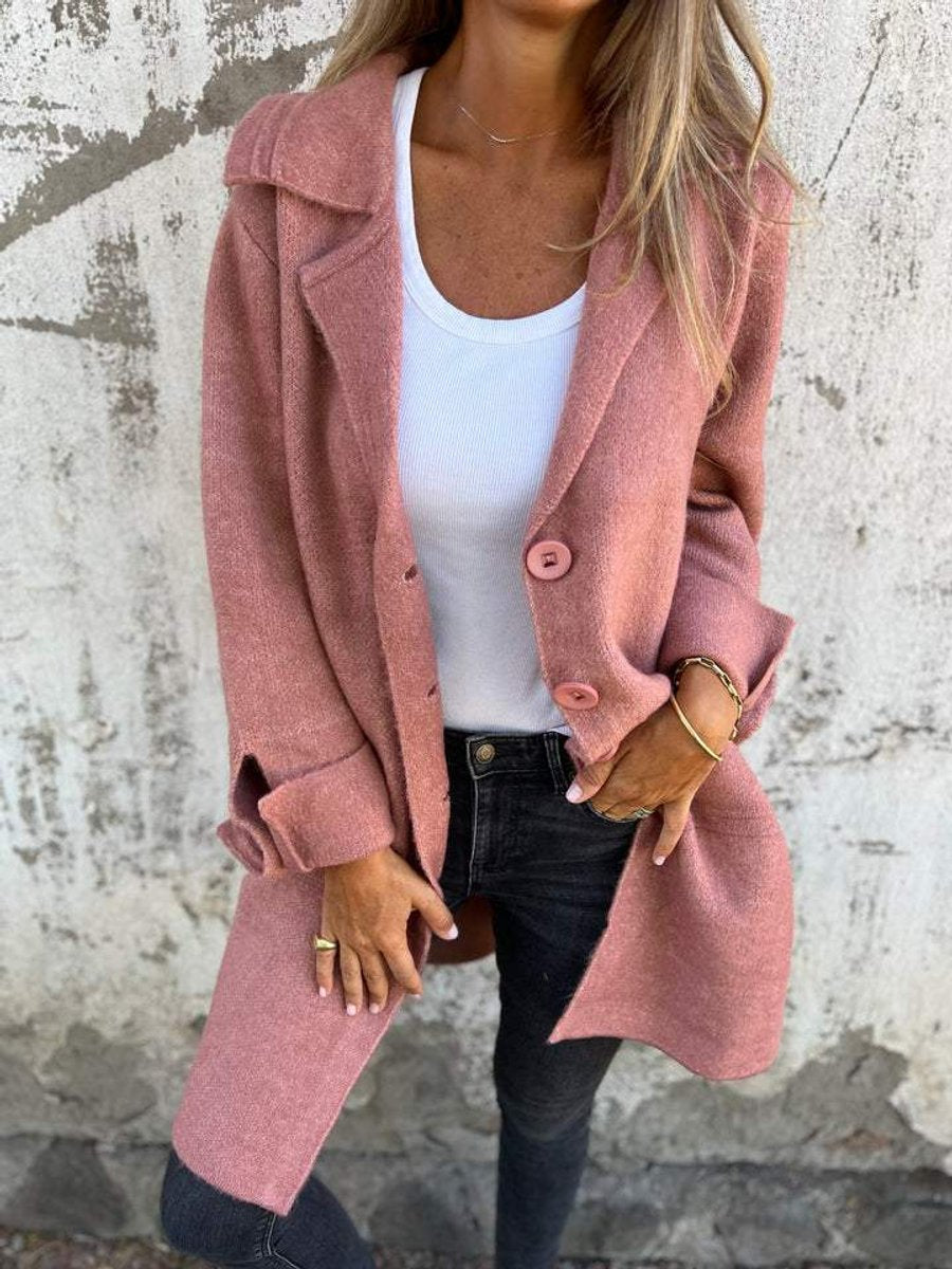 Women’s relaxed-fit longline lapel coat by Bennett and Lowe, with button-front closure and classic lapel design.