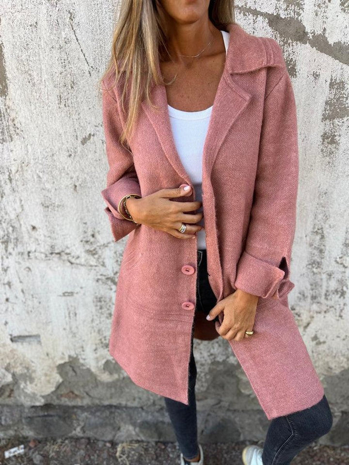 Women's relaxed-fit longline lapel coat by Bennett and Lowe, featuring a button front and classic lapel design.