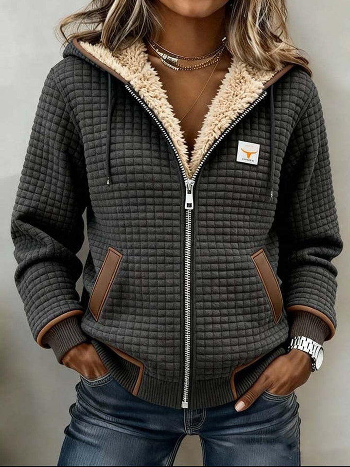 Bennett and Lowe Penelope women's sherpa-lined quilted hooded jacket with full zip, cozy fleece interior, and quilted design.
