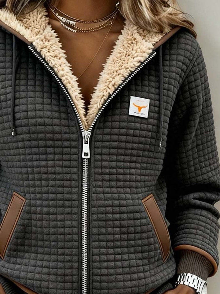 Bennett and Lowe Penelope women's sherpa-lined quilted hooded jacket with full zipper and fleece lining, stylish winter outerwear.