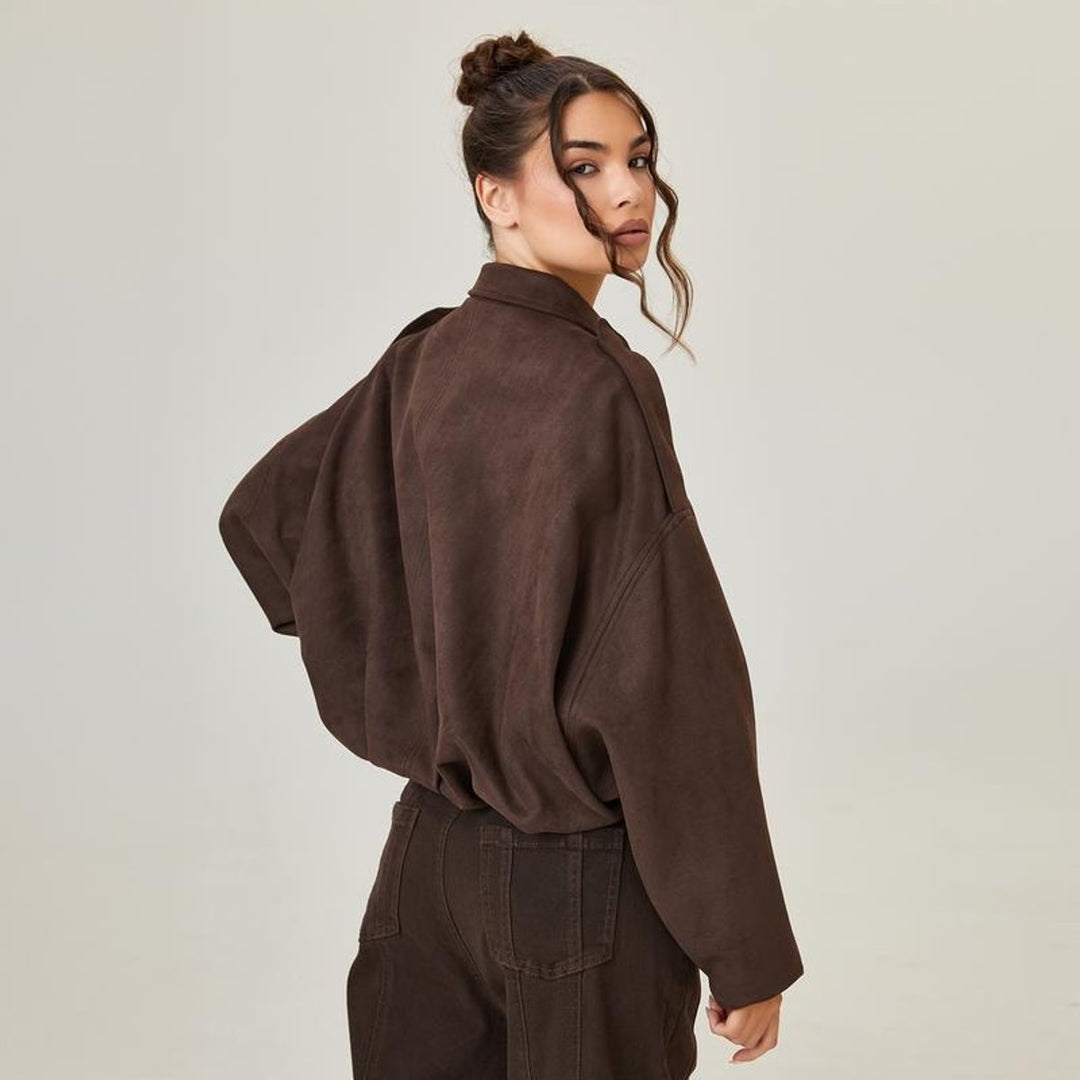Vintage-inspired women's oversized faux suede bomber jacket by Bennett and Lowe, relaxed fit with classic bomber style.