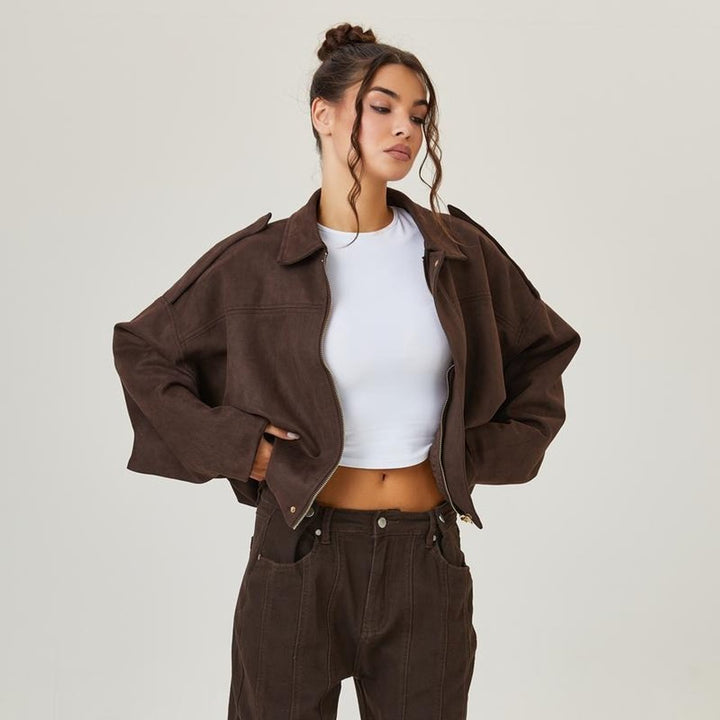 Women’s vintage-inspired oversized faux suede bomber jacket by Bennett and Lowe, relaxed fit with classic bomber silhouette.