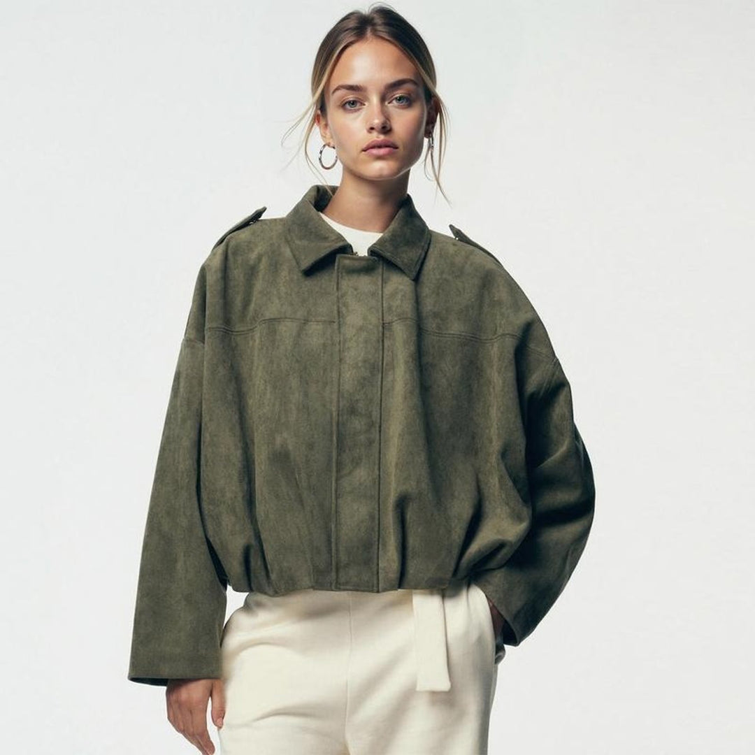 Women’s vintage-inspired oversized faux suede bomber jacket by Bennett and Lowe, relaxed fit with classic bomber style.