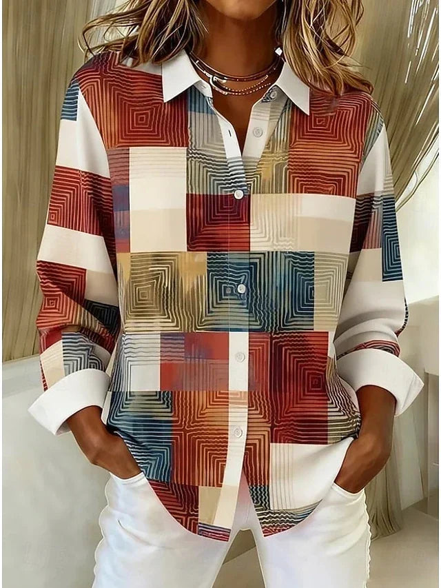 Therese patchwork button-front blouse by Bennett and Lowe, featuring colorful mixed fabric patchwork and a classic button-up design.